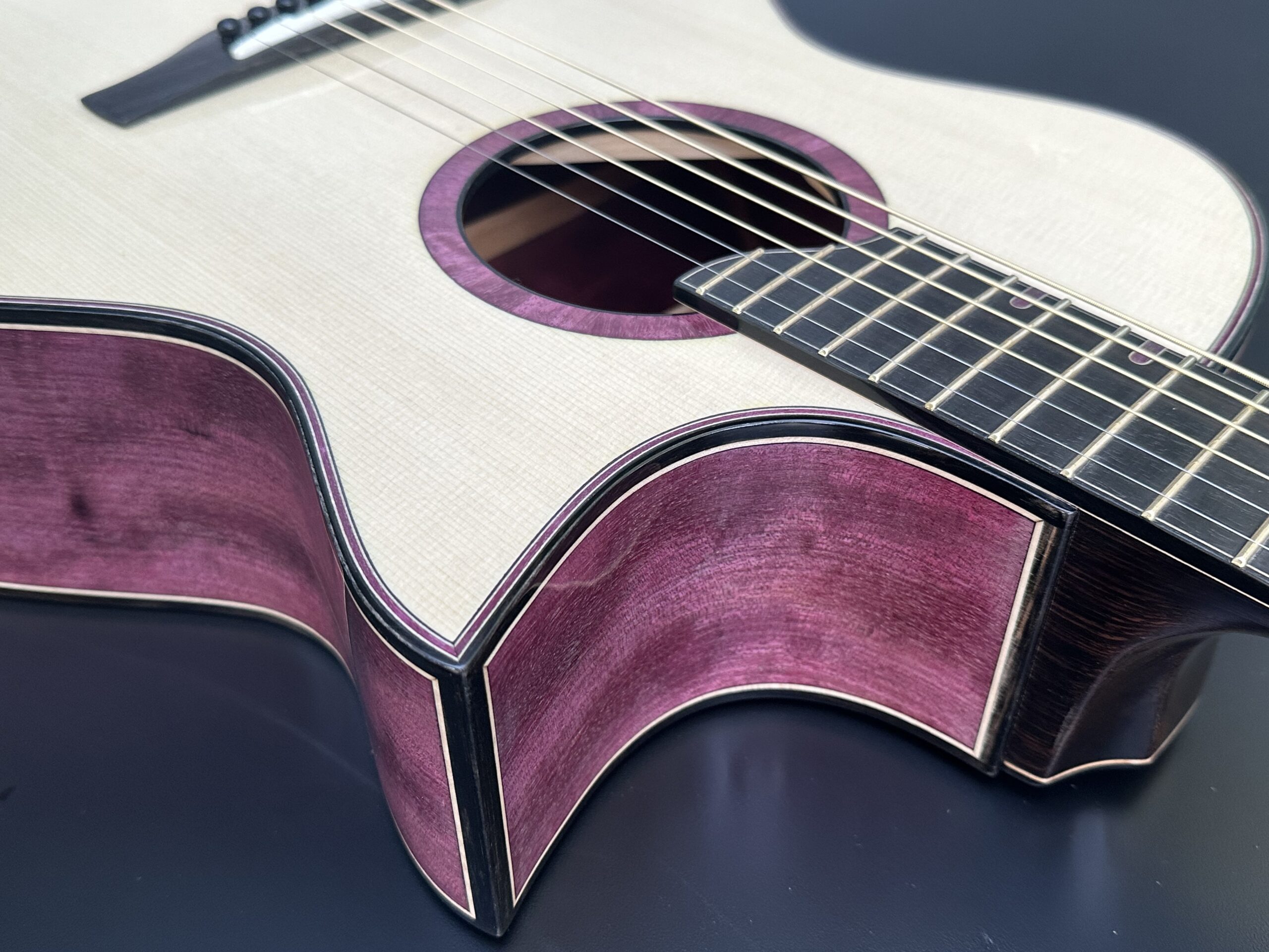 Purpleheart Sucia Guitar Handmade by Joe Whitman of Madrona Guitars.